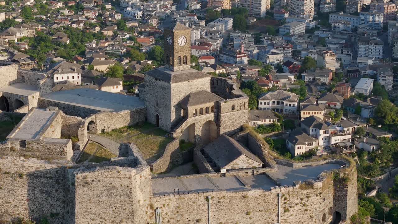 Drone panoramic of Gjirokastra Castle in Albania, beautiful reveal of town. Travel destination, sightseeing.