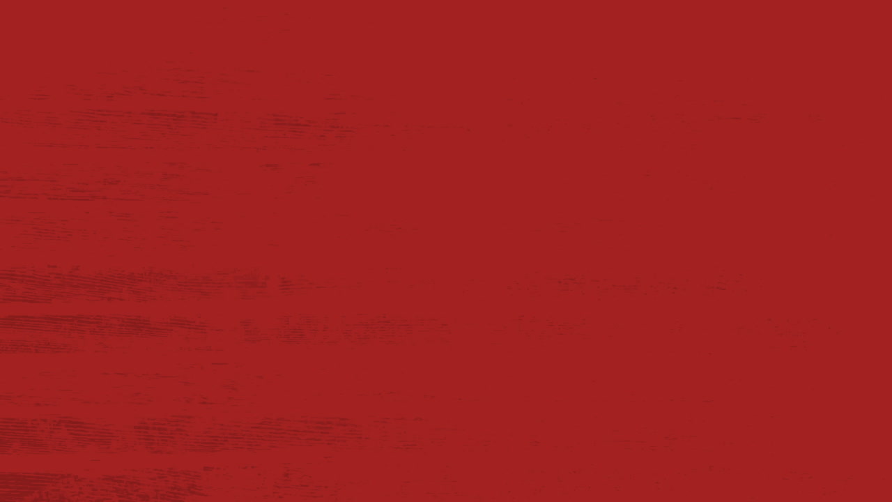 Lebendige rote Farbspritzer auf Hintergrund