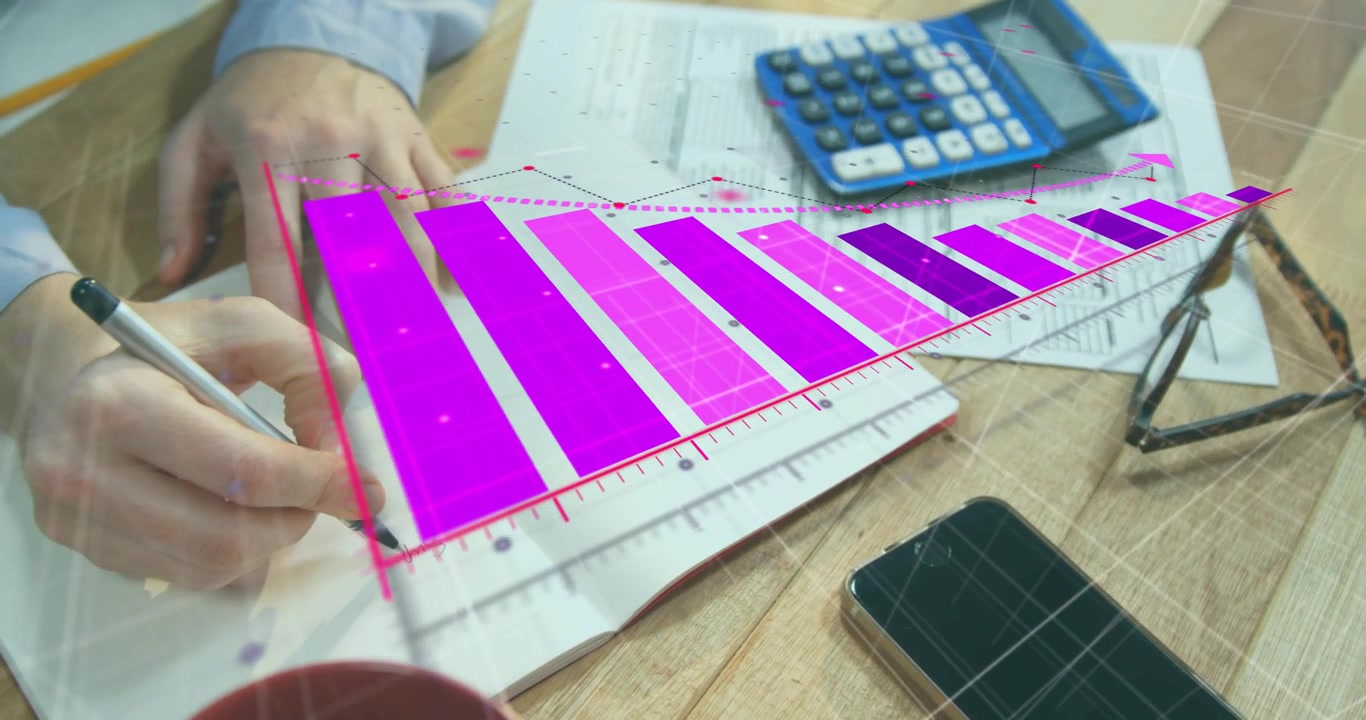 After pause man's hands holding notebook while writing notes as pink 3D bars rising showing trends