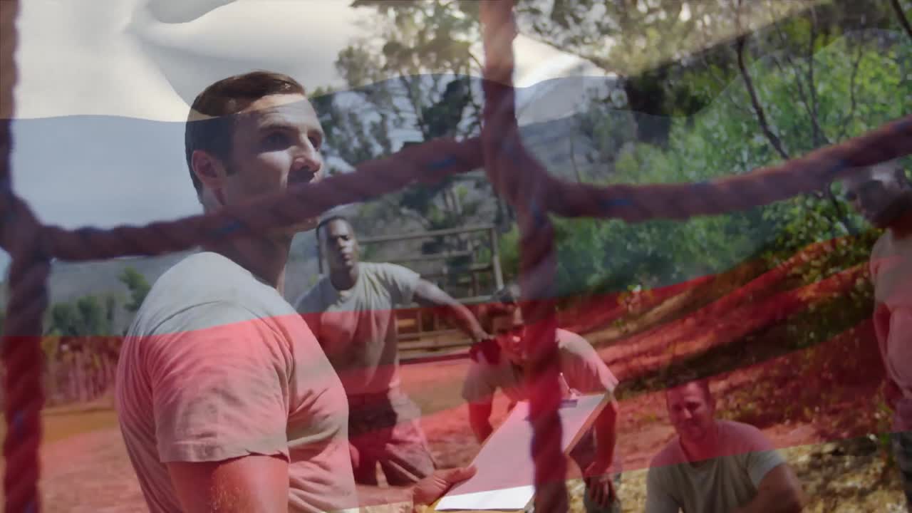 animación de la bandera de colombia sobre un hombre afroamericano durante el entrenamiento de una carrera de obstáculos