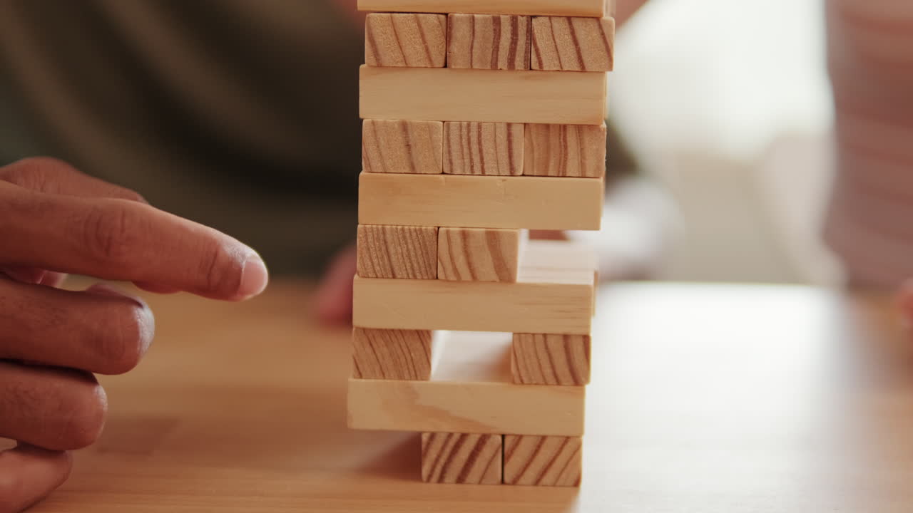 Couple Playing Jenga at Home