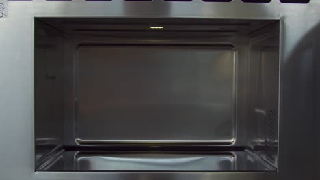 empty stainless steel microwave oven interior