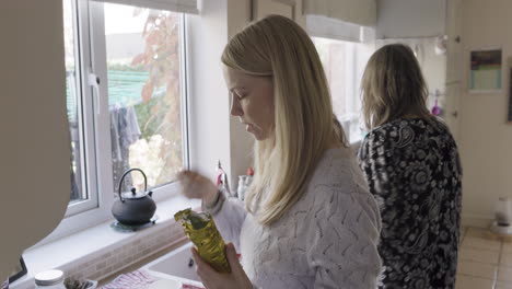 a woman in a kitchen