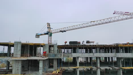 flying over the construction site. construction crane on building background