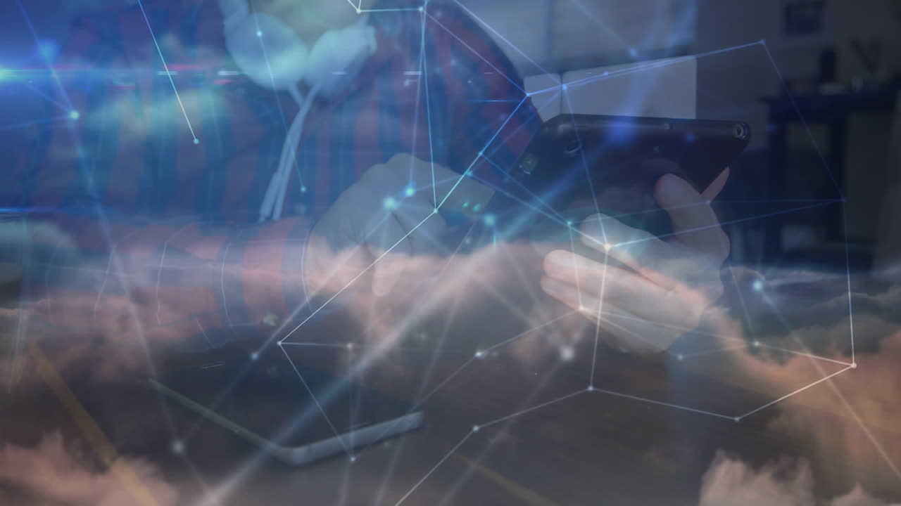 Animation of networks of connections with icons over man using smartphone