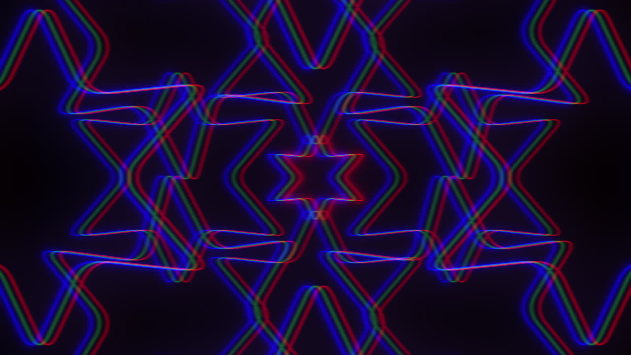 A vibrant and dynamic multicolored zigzag pattern with red, blue, and purple lines set against a dark background. The lines intersect and run in parallel, creating an engaging visual contrast