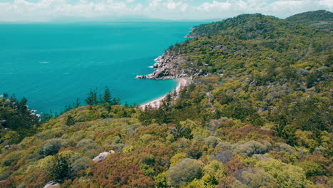 cinematic aerial drone view of florence bay, in magnetic island