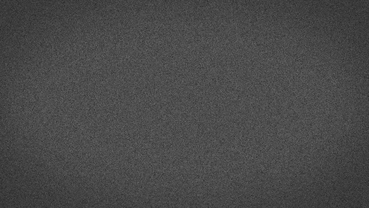 Animation of grey abstract noise specks moving fast on grey background
