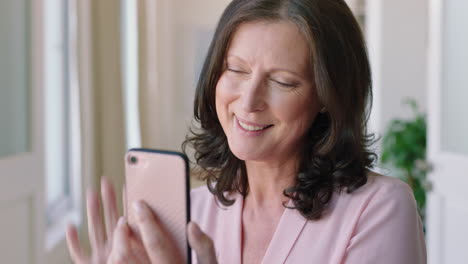 deaf woman having video chat holding smartphone using sign language deaf grandmother waving enjoying connection chatting on mobile phone