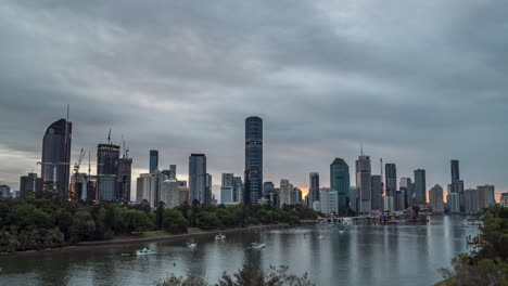 boats on brisbane river, city skyline in background