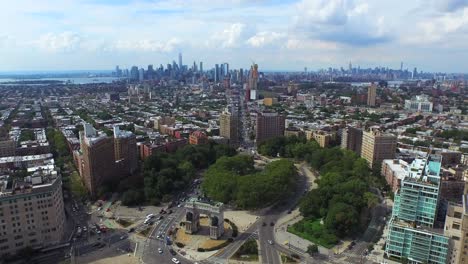 cinematic parallaxing aerial of brooklyn's grand army plaza with nyc skyline 4k