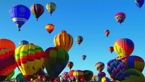 colorful balloons rise above the albuquerque balloon festival 3