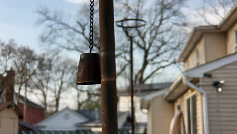 rusty tiki torch covers blowing in breeze