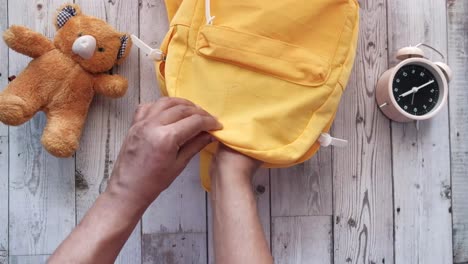 cleaning a child's backpack