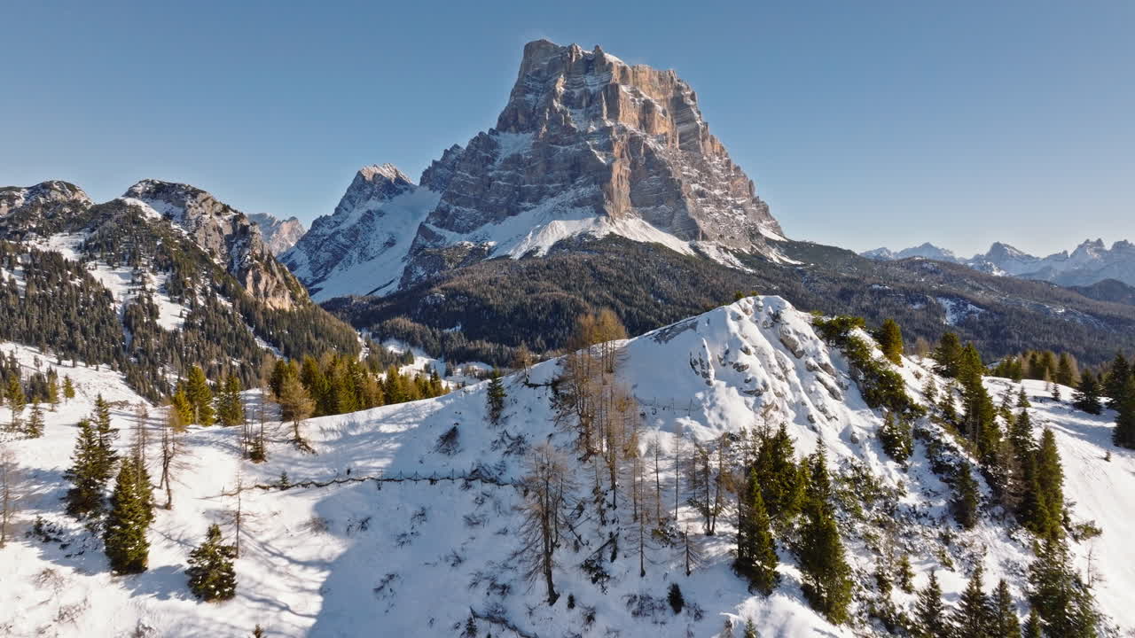 Aerial drone view of snow on the mountains in the Dolomites, Italy