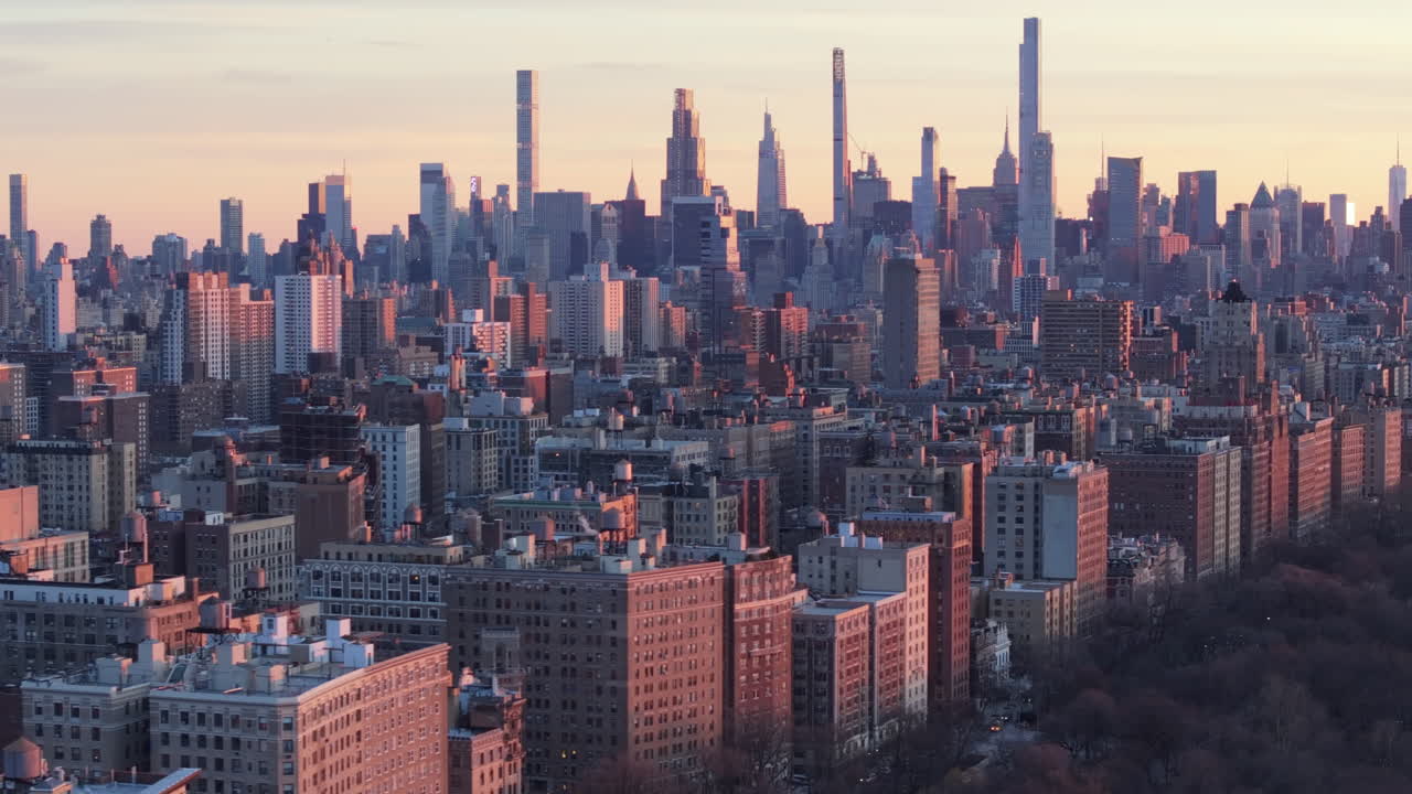Aerial view of the New York City skyline at dusk. Shot in Harlem looking south towards Midtown Manhattan.