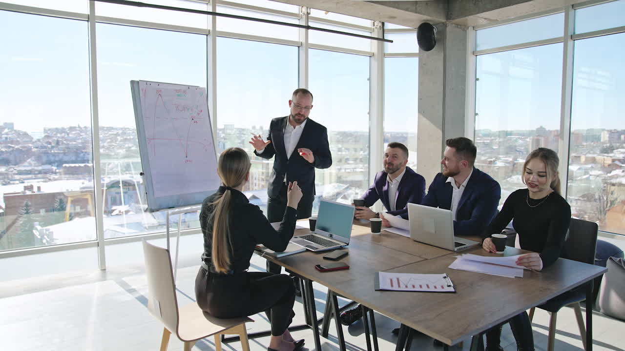 Informal and light atmosphere at the office meeting. The presenter makes speech and explains the chart in front of the teammates. Circular background.