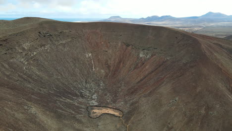 drone view of the crater of volcanes de bayuyo in fuerteventura, canarias, spain