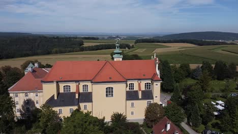 Drone-is-flying-over-by-a-Church-tower-from-above