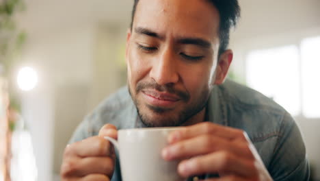 man drinking coffee