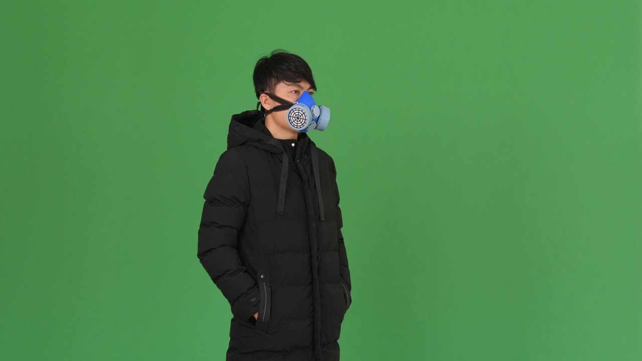 Asian Man In Protective Mask