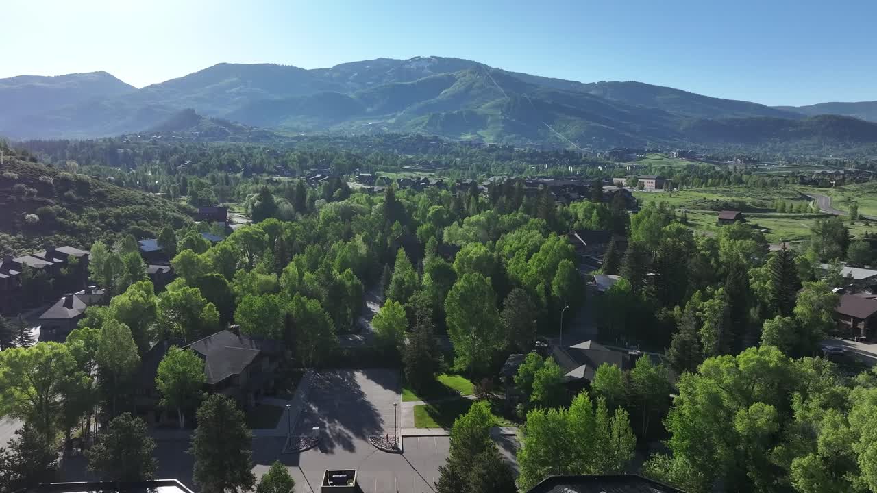 Steamboat Springs Colorado 2025 spring drone flight focusing on the ski mountain with the village below.