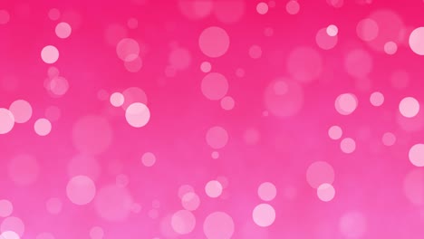 sparkling bubbles float on a pink background.
