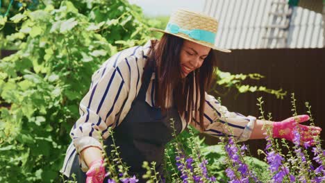 woman gardening in a beautiful flower garden
