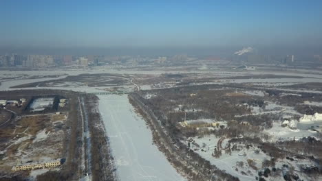 high winter aerial over ice cold northern chinese city of harbin