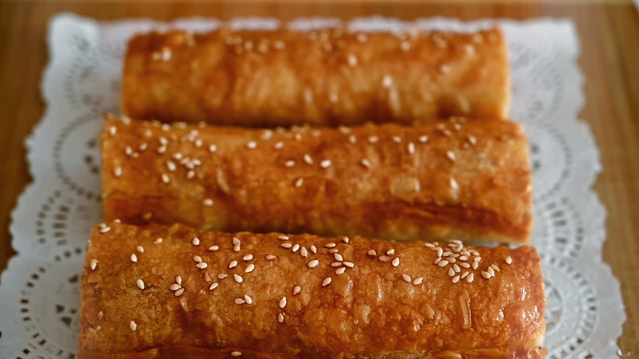 Four ready-made placints with stuffing on a fabric. Slow motion