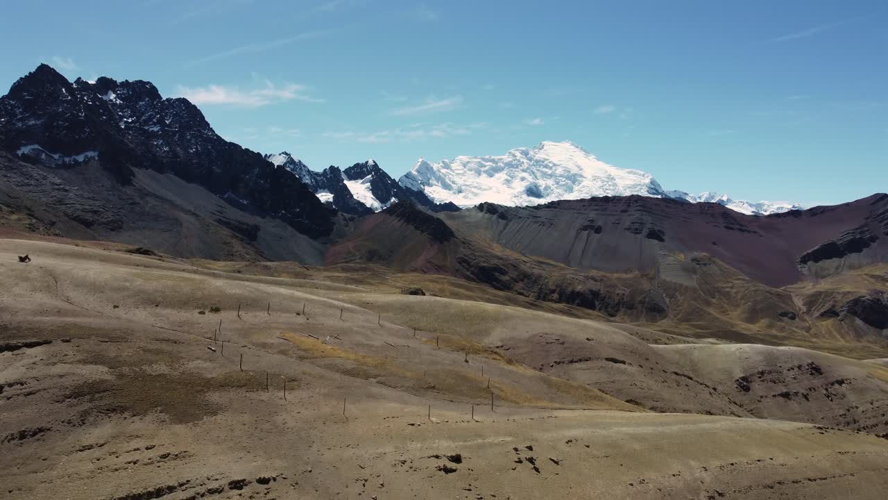 Vinicunca Peru Peruvian Andes mountains snow covered peak nature aerial drone landscape