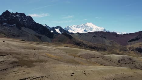 vinicunca peru peruvian andes mountains snow covered peak nature aerial drone landscape
