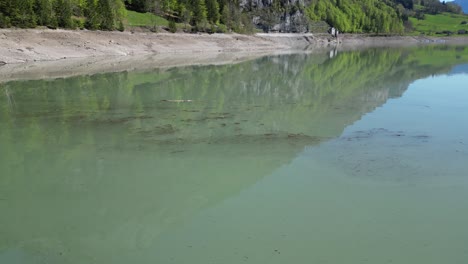 Muddy-Water-Surface-In-Klöntalersee-Glarus-Kanton-Lake-In-Switzerland