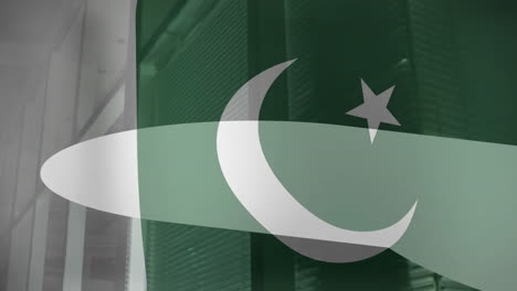 pakistan flag overlaying animation of server racks in modern data center