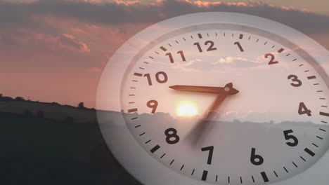 ticking clock over sunset