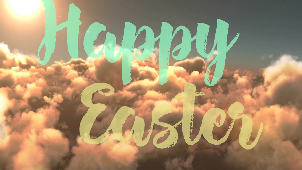 Il sole che sorge fa fluttuare le nuvole, un bagliore scivola sul testo "Buona Pasqua" che rimane centrato per il calore.