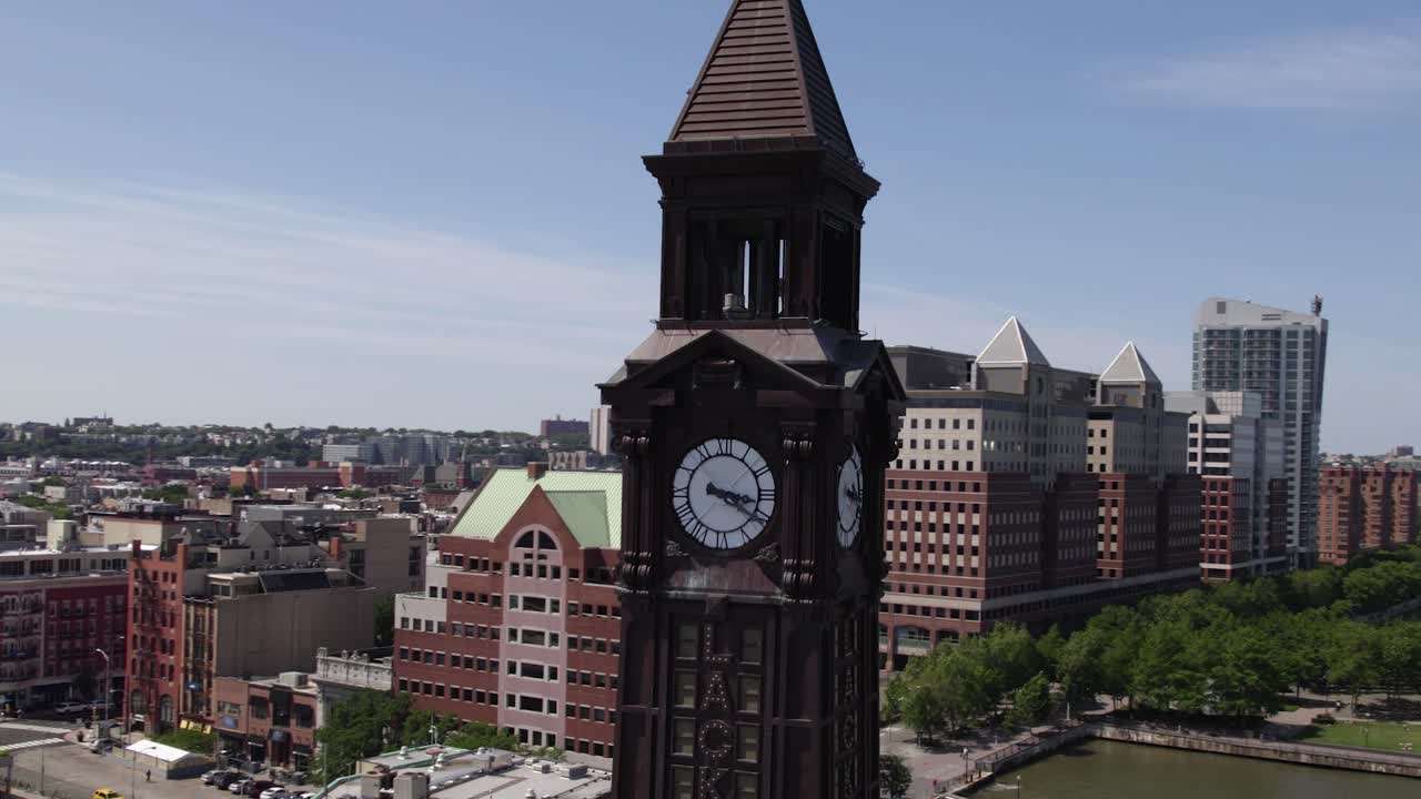 Close up of the Lackawana bell tower at the Hoboken Terminal, in New Jersey, USA - orbiting aerial