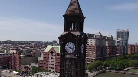 Close-up-of-the-Lackawana-bell-tower-at-the-Hoboken-Terminal,-in-New-Jersey,-USA---orbiting-aerial