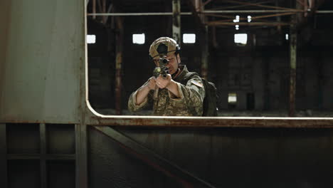 soldier aiming with a rifle in a ruined building