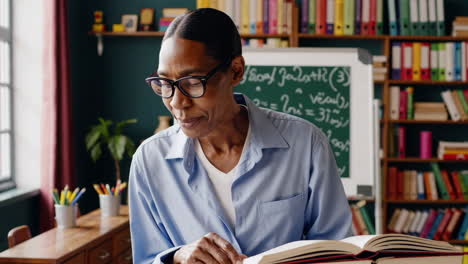 teacher reading book in classroom
