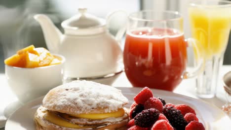 breakfast with berries and juice