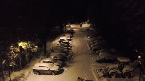 snowy parking lot at night