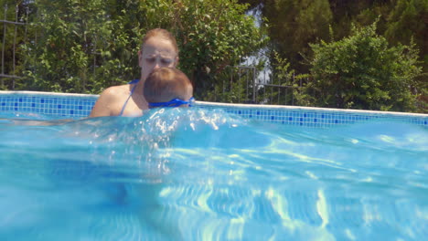 Mother-Teaching-Son-Swimming