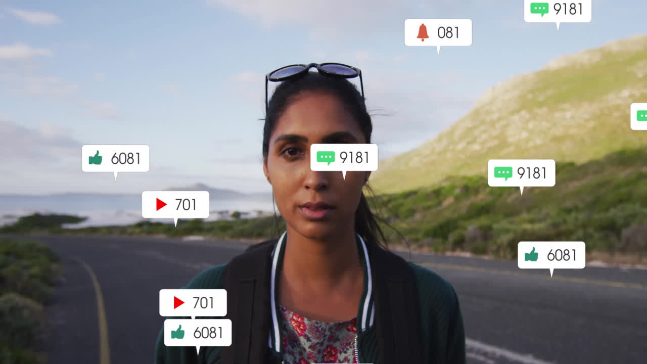 Standing on road, woman surrounded by animation of social media notification icons