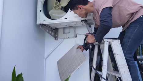 cleaning an outdoor air conditioner unit