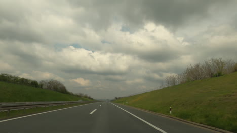 hyperlapse footage, vehicle dashcam pov of highway drive