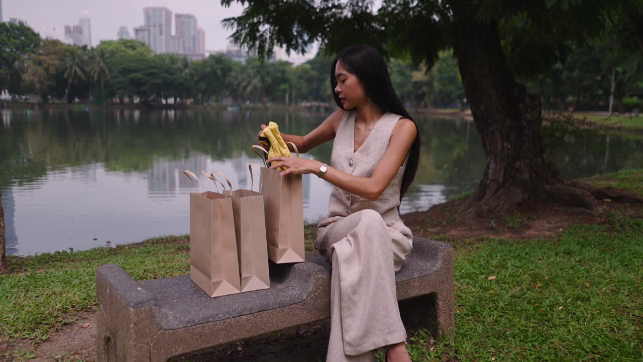 Woman Shopping in a Park