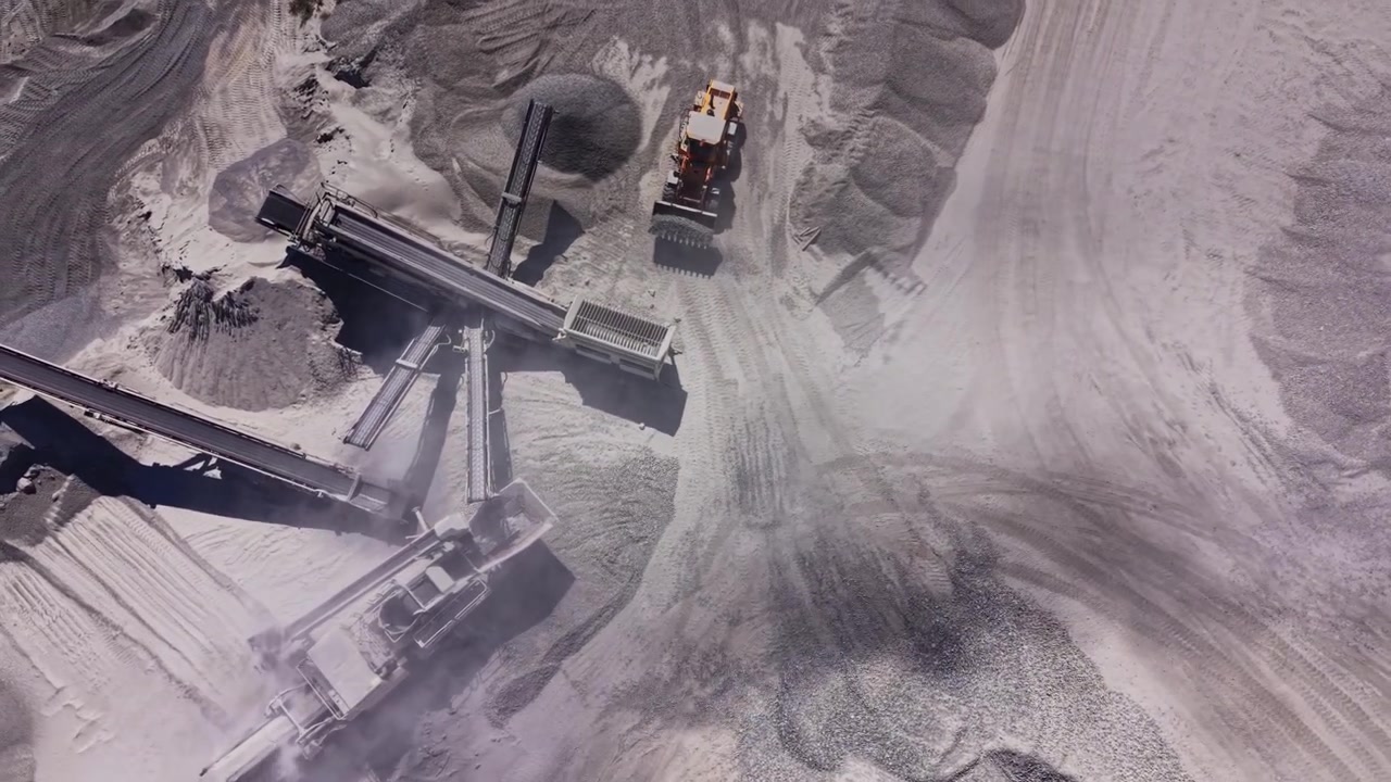 Heavy machinery works in industrial area during daylight