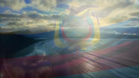 digital composition of ecuador flag waving against aerial view of the sea