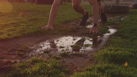 young man training at an outdoor gym bootcamp